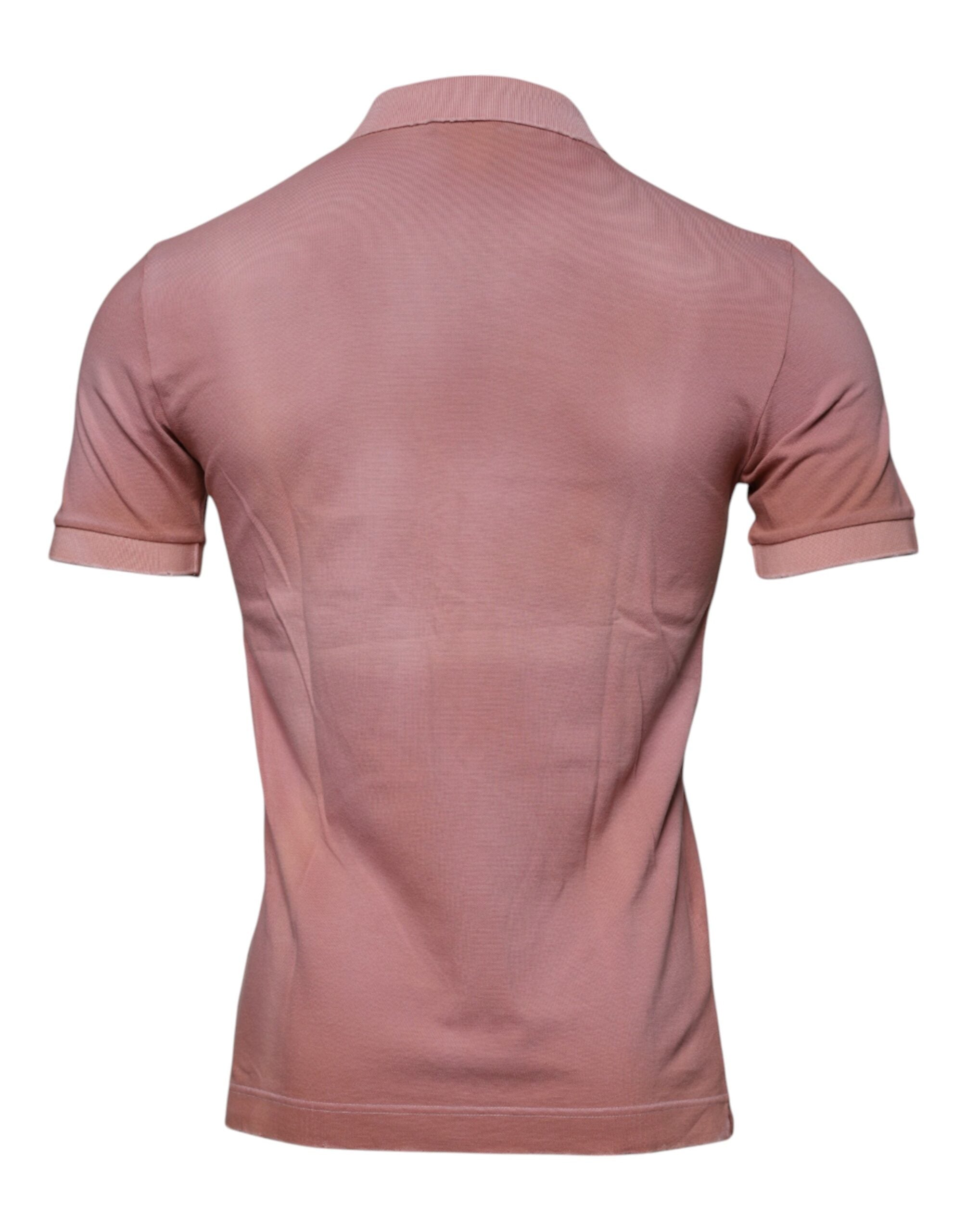 T-shirt polo à manches courtes rose Dolce & Gabbana avec col à couronne, style élégant et moderne.