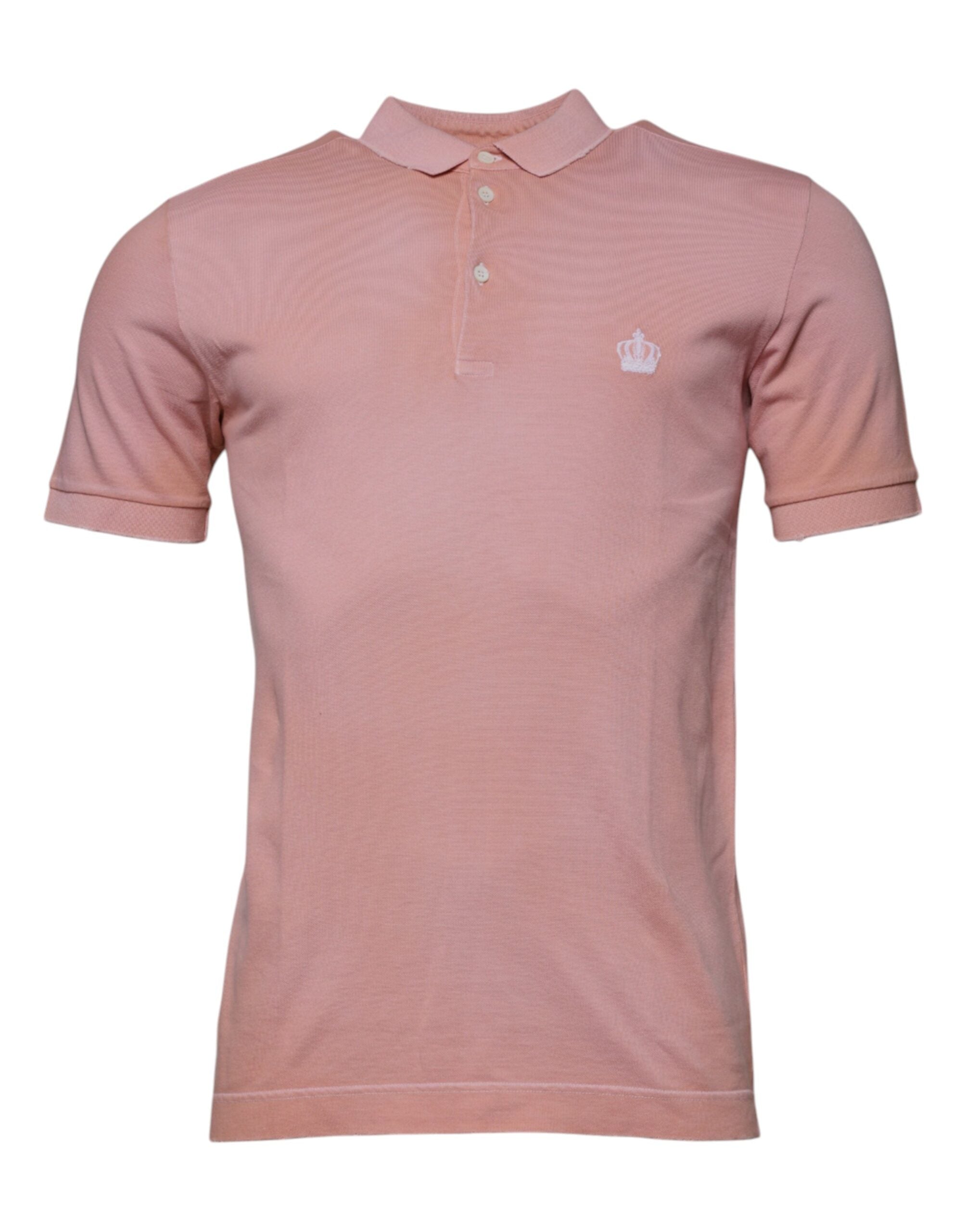 T-shirt polo à manches courtes rose Dolce & Gabbana avec col à motif couronne, vue de face.