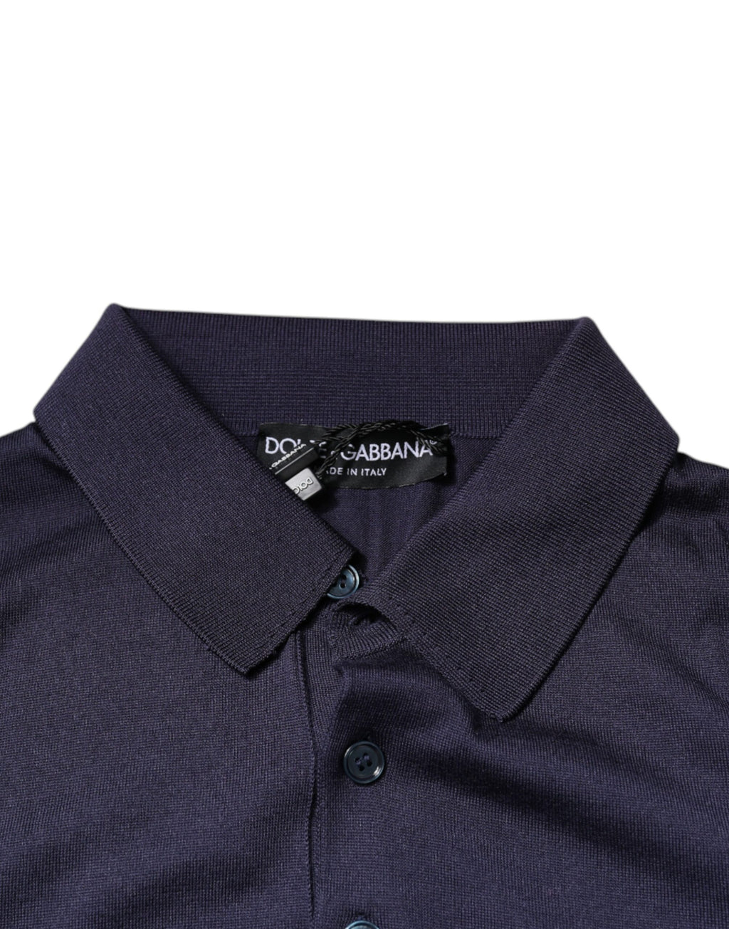 Polo en soie bleue à col et manches courtes de Dolce & Gabbana, élégant et confortable.