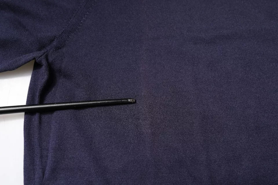 Polo Dolce & Gabbana en soie bleue à col avec manches courtes, élégant et confortable.