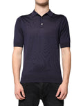 Polo Dolce & Gabbana en soie bleue avec col et manches courtes, élégant et léger.