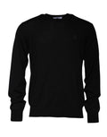 Pull en laine noir Dolce & Gabbana avec logo, col rond, détails élégants et texture visible.