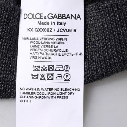 Pull-over gris foncé Dolce & Gabbana avec logo DG à la poitrine, col ras du cou en maille douce et élégante.