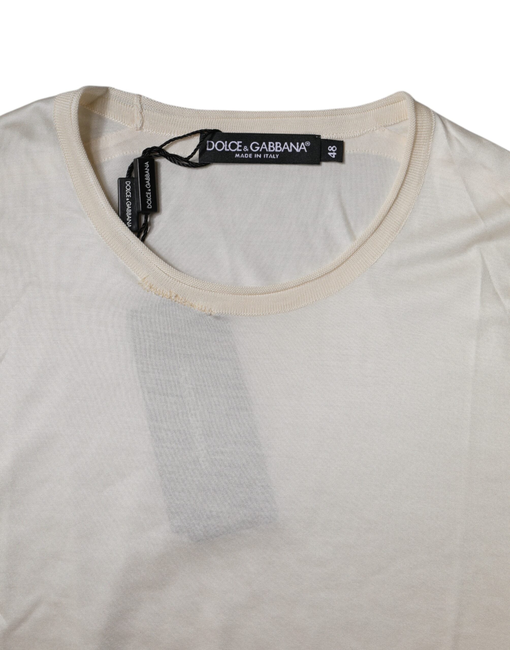 T-shirt Dolce & Gabbana en soie blanche à col rond et manches courtes, style élégant et léger.