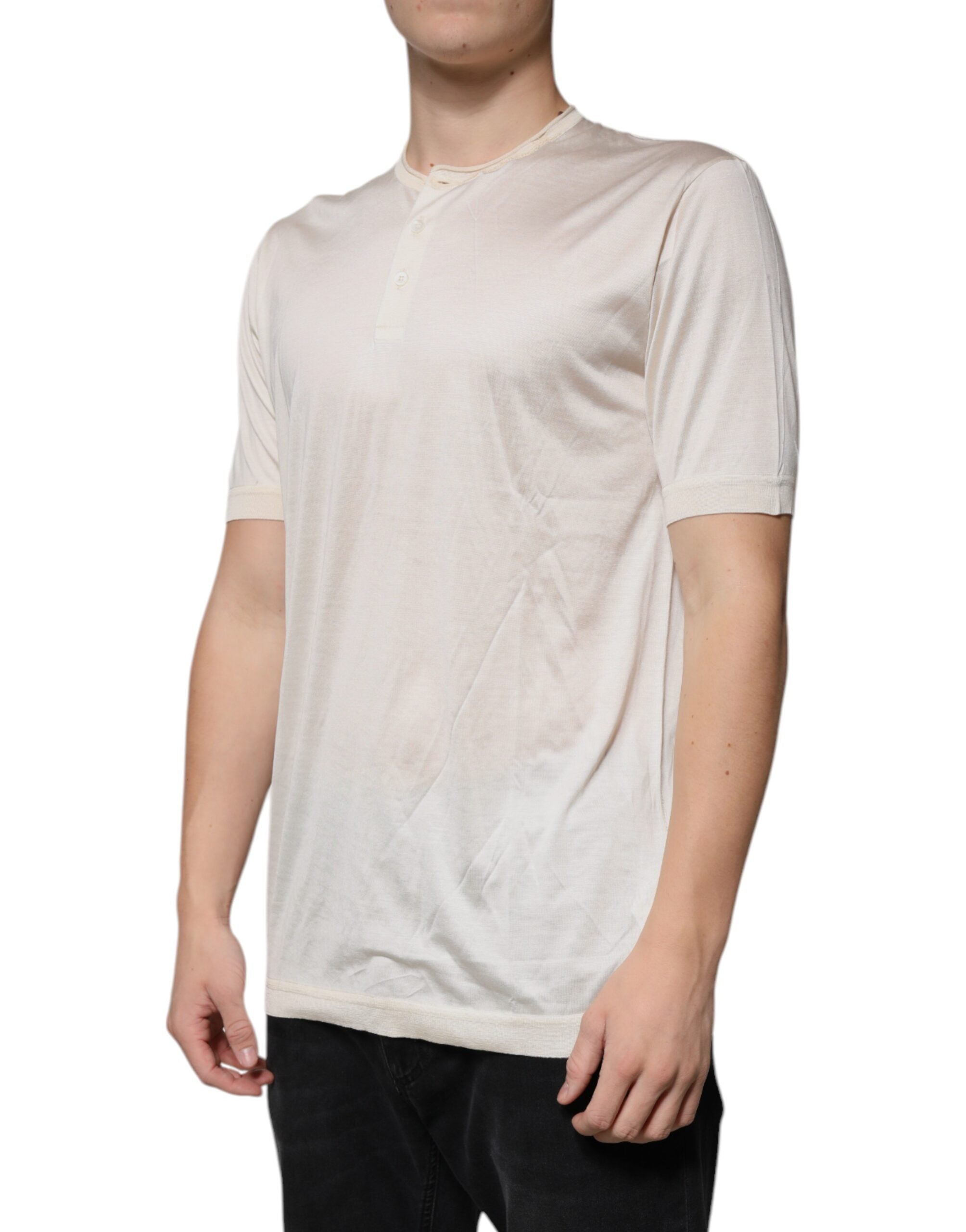 T-shirt homme en soie blanche Dolce & Gabbana à col rond et manches longues, style Henley, élégant et confortable.