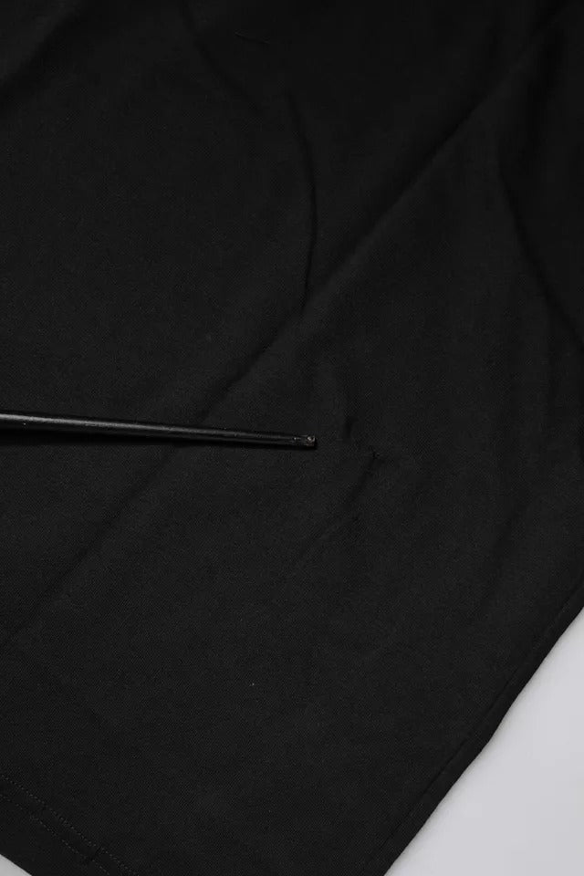 T-shirt noir en coton Dolce & Gabbana avec logo imprimé à manches courtes, vue de face.