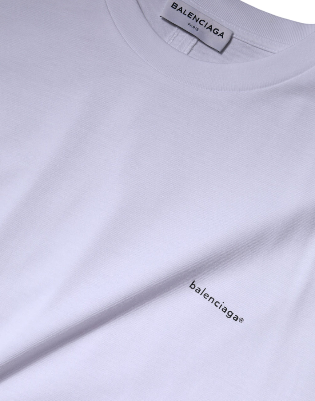 T-shirt blanc Balenciaga en coton à logo, col rond et manches courtes, vue de face.