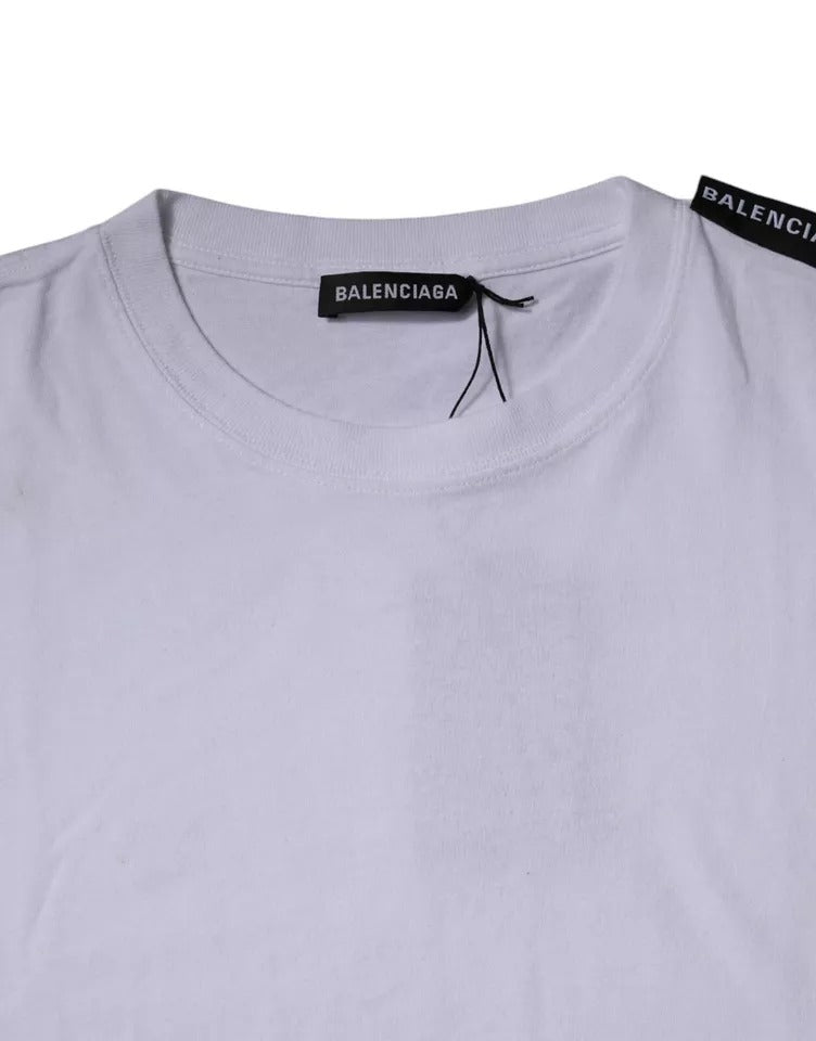 T-shirt blanc Balenciaga en coton jersey avec logo, col ras du cou et manches courtes, visible en détail.
