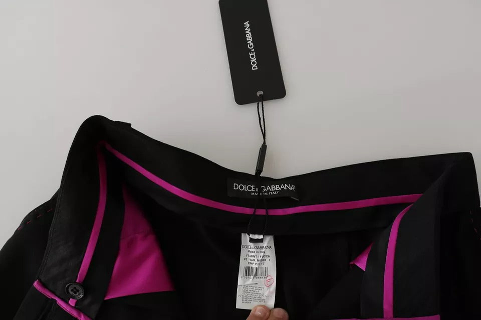 Pantalons courts en laine noire Dolce & Gabbana à taille haute avec plis frontaux, style élégant et moderne.