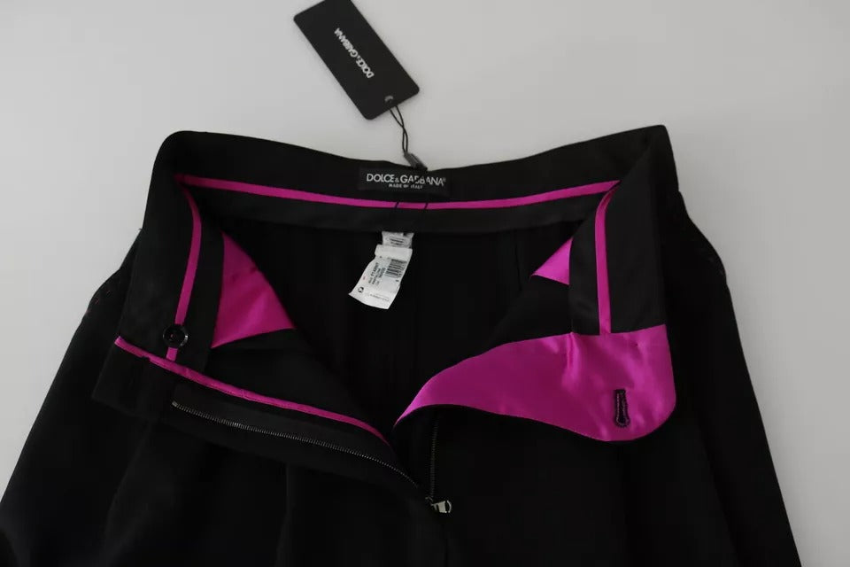 Pantalons courts en laine noire Dolce & Gabbana à taille haute et plis frontaux, mode élégante et sophistiquée.