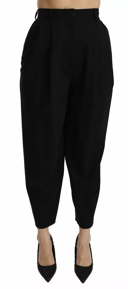 Pantalons cropped en laine noire Dolce & Gabbana avec taille haute et plis frontaux, mode élégante et sophistiquée.