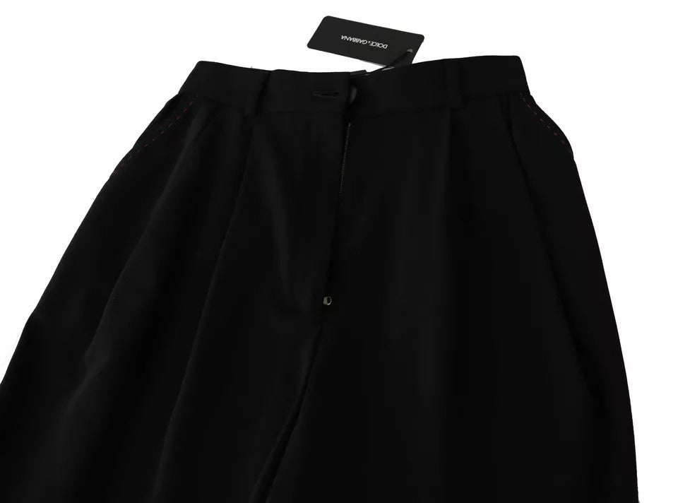 Pantalons courts en laine noire Dolce & Gabbana à taille haute avec plis frontaux.