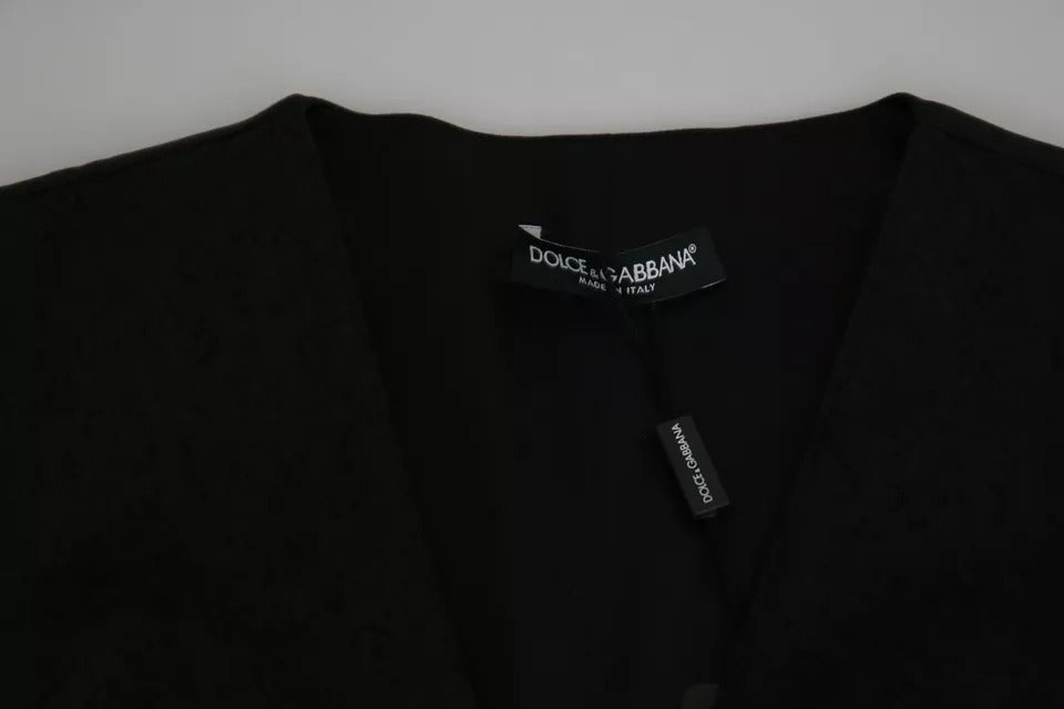 Gilet en dentelle noire Dolce & Gabbana, veste slim en soie élégante, portée comme haut chic et sophistiqué.