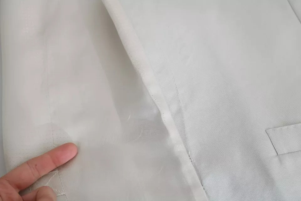 Gilet formel en coton et soie blanc cassé Dolce & Gabbana, veste élégante avec détails sophistiqués.
