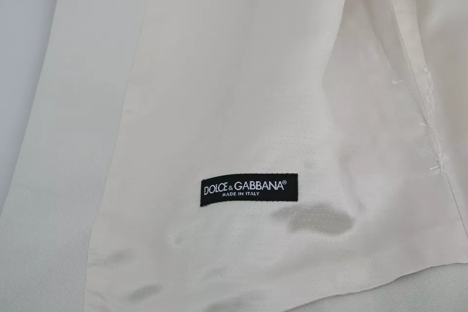 Gilet formel en coton et soie Dolce & Gabbana, couleur blanche, avec finition élégante, porté sur un mannequin.