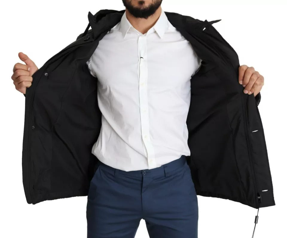Manteau homme noir Dolce & Gabbana, veste matelassée à capuche en polyester, style puffer chaud et tendance.