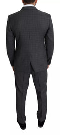 Costume homme en laine grise Dolce & Gabbana, costume formel 2 pièces Martini, détail du tissu et de la coupe élégante.