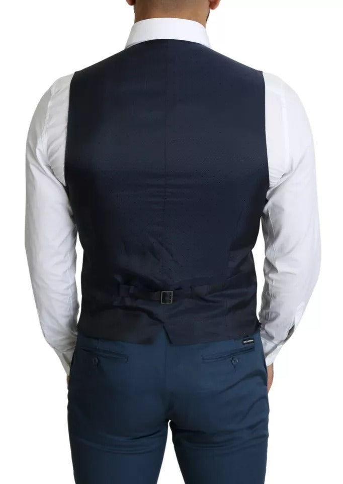 Gilet homme de costume bleu marine Dolce & Gabbana, élégant, en tissu fin, avec boutons sur le devant, porté sur un fond blanc.