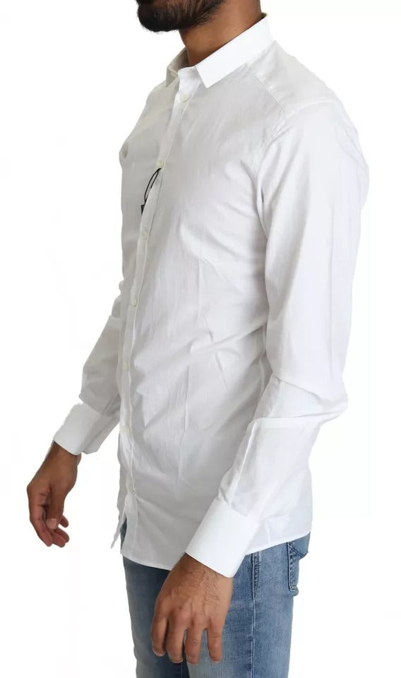 Haut de robe formel blanc en coton Dolce & Gabbana avec détails dorés, vue de face.