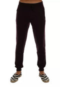 Pantalon de sport Dolce & Gabbana violet en cachemire pour entraînement, visible avec détails en tissu doux et coupe sportive.