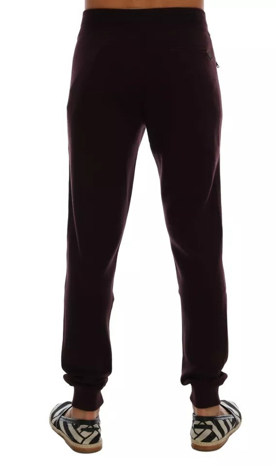 Pantalon de sport Dolce & Gabbana en cachemire violet, parfait pour l'entraînement et le sport, visible en gros plan.