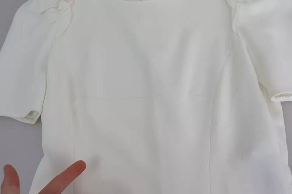 Blouse blanche en viscose extensible à manches courtes de Dolce & Gabbana, vue de face sur fond neutre.