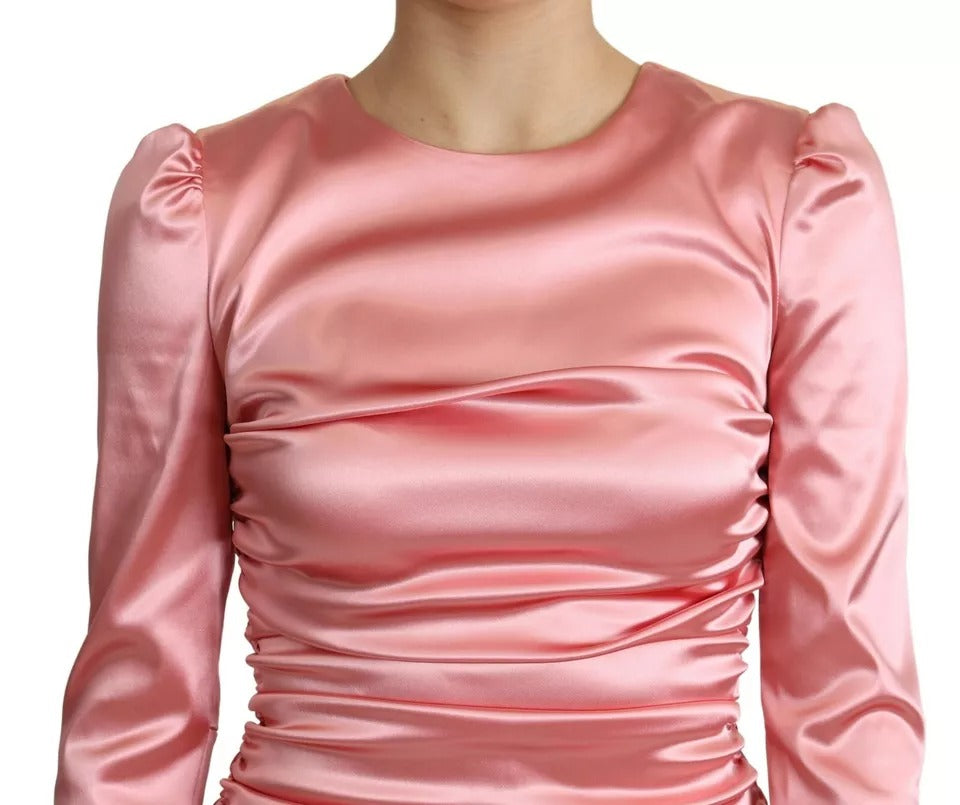 Robe midi moulante à manches longues rose de Dolce & Gabbana, style élégant et sophistiqué pour femme.