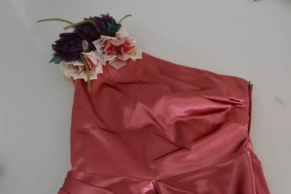 Robe midi rose en drapé avec appliqué floral Dolce & Gabbana, élégante et féminine, visible en détail sur l'image.