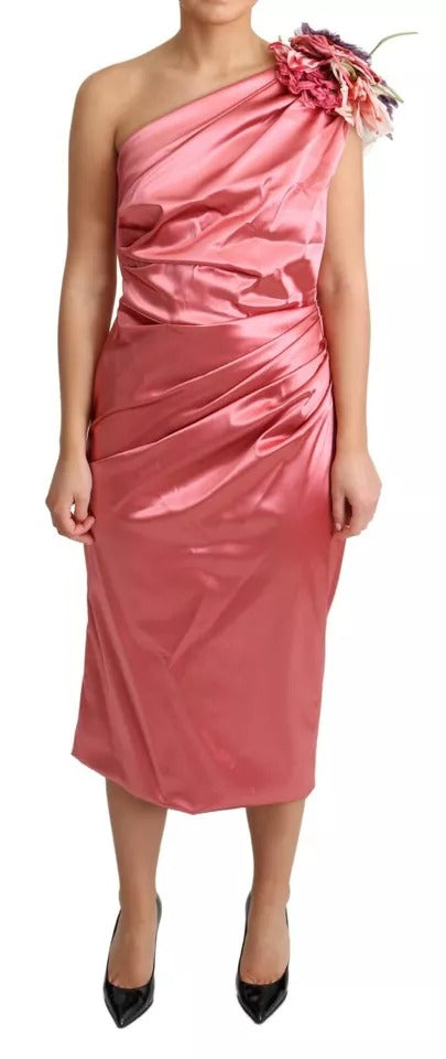 Robe midi rose Dolce & Gabbana à drapé avec appliqués floraux, élégance féminine et détails sophistiqués.