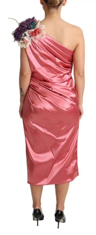 Robe midi rose Dolce & Gabbana en tissu drapé avec appliqué floral, élégante et féminine.