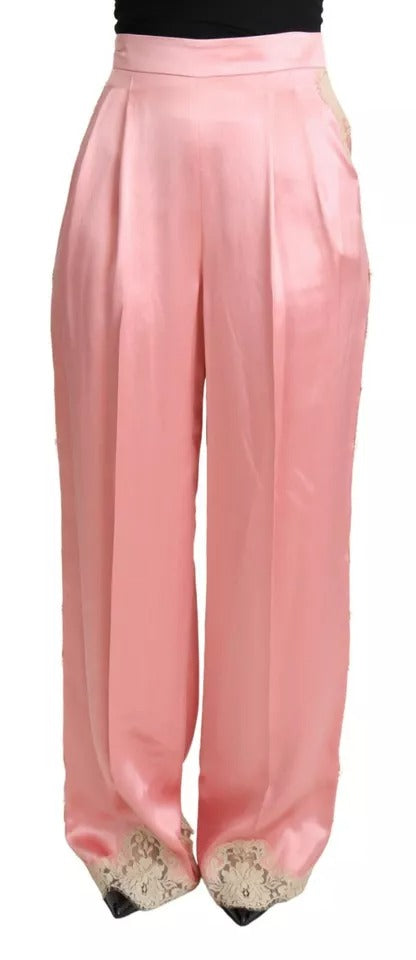 Pantalons en satin de soie rose avec galon en dentelle Dolce & Gabbana, coupe large et élégante.