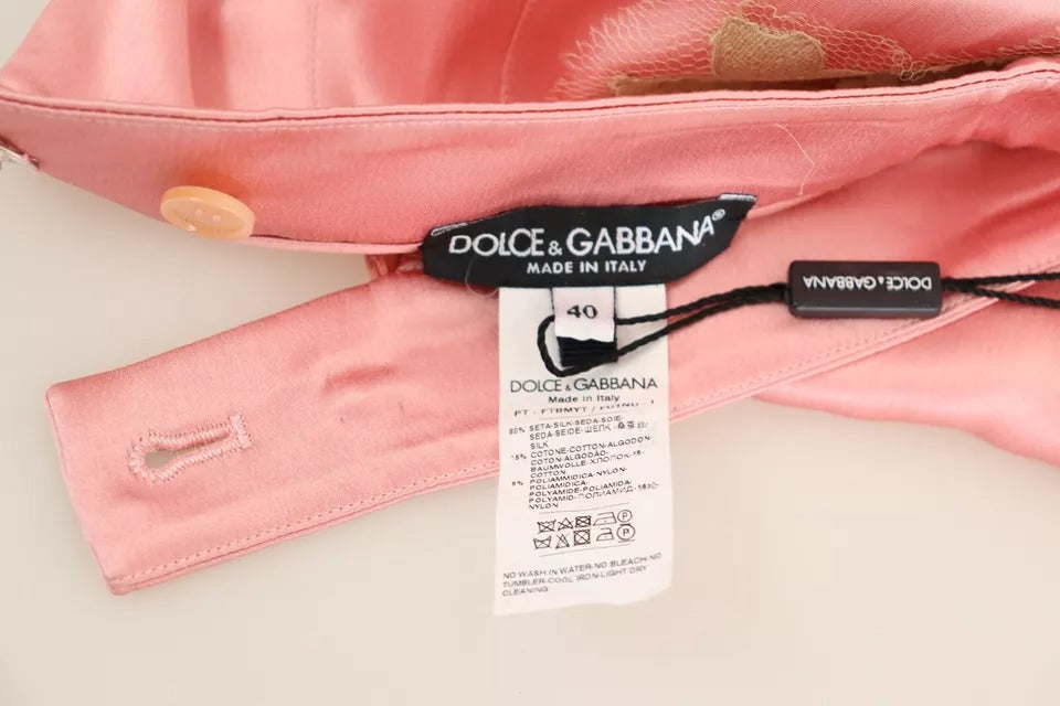 Pantalons en satin de soie rose avec bordure en dentelle Dolce & Gabbana, coupe large et élégante.