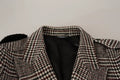 Manteau long à carreaux gris Dolce & Gabbana, trench coat élégant avec ceinture et col classique, parfait pour l'automne.
