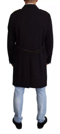 Manteau trench bleu Dolce & Gabbana en laine longue et extensible, élégant et sophistiqué, porté sur un mannequin.