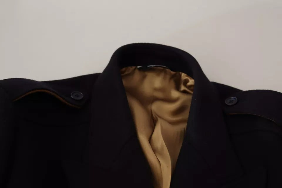 Manteau trench bleu long en laine stretch de Dolce & Gabbana, veste élégante avec ceinture et détails sophistiqués.