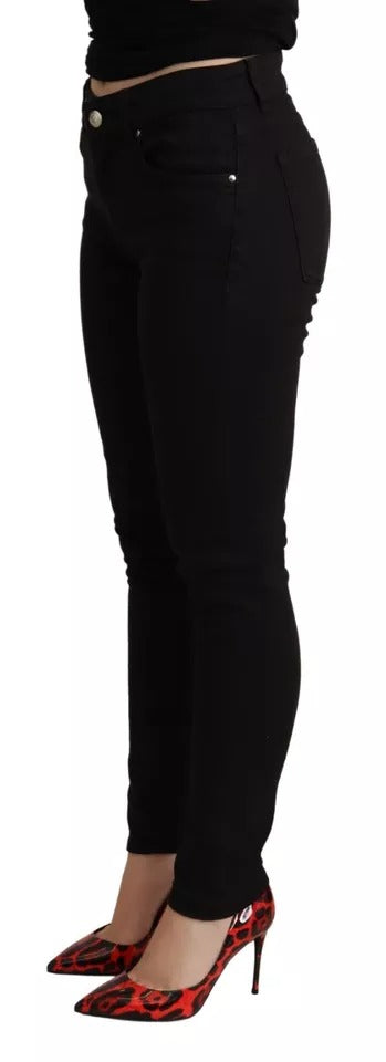 Jeans skinny en coton stretch noir de Dolce & Gabbana, denim slim ajusté, visible sur un mannequin.
