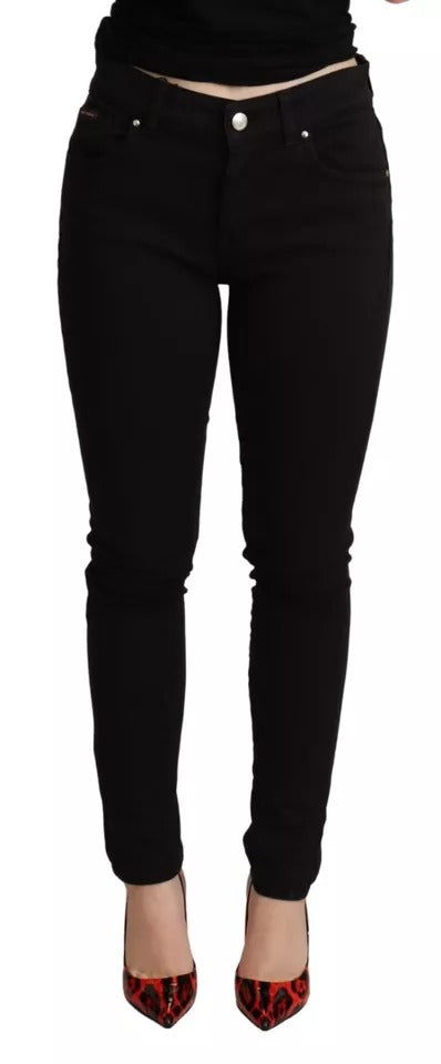 Jeans skinny en coton stretch noir de Dolce & Gabbana, coupe ajustée et style élégant, visibles en détail dans l'image.