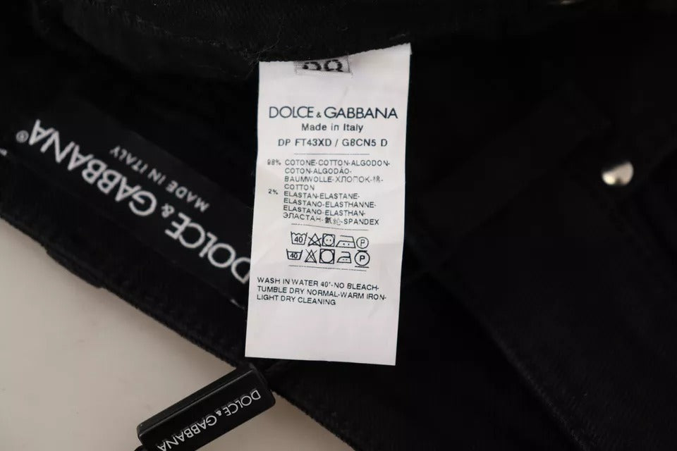 Jeans skinny en denim noir en coton stretch de Dolce & Gabbana, coupe ajustée et style moderne.
