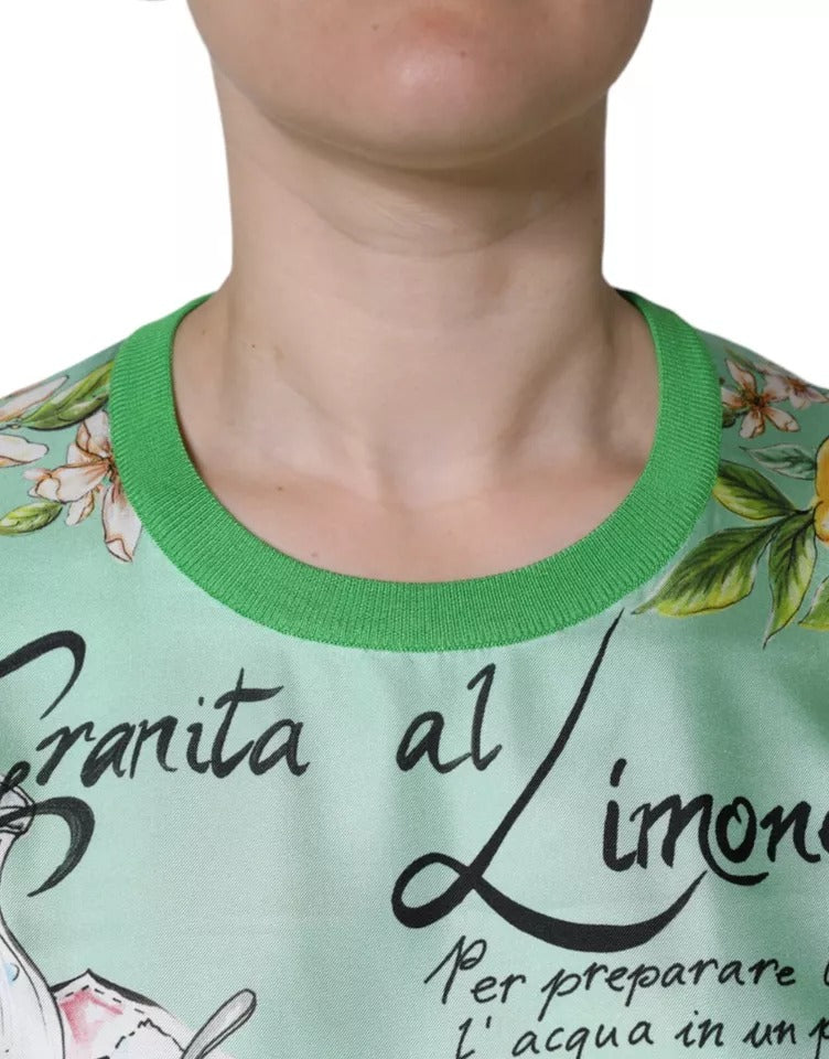 Pull en soie vert Dolce & Gabbana Granita Al Limone à manches longues, détails élégants et tissu luxueux visible sur l'image.