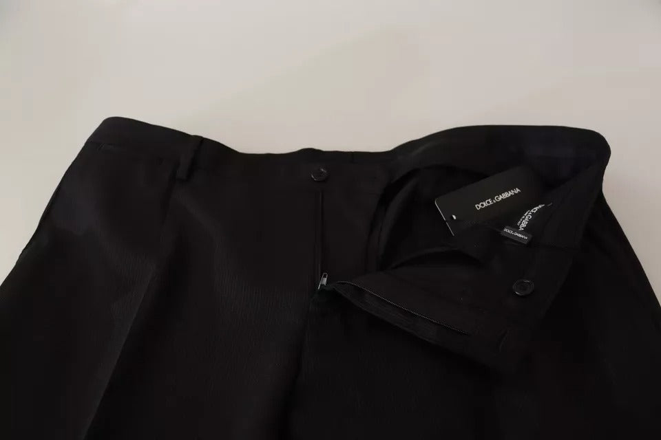 Pantalon noir Dolce & Gabbana, pantalon skinny formel pour femme, en tissu élégant, porté sur un mannequin.