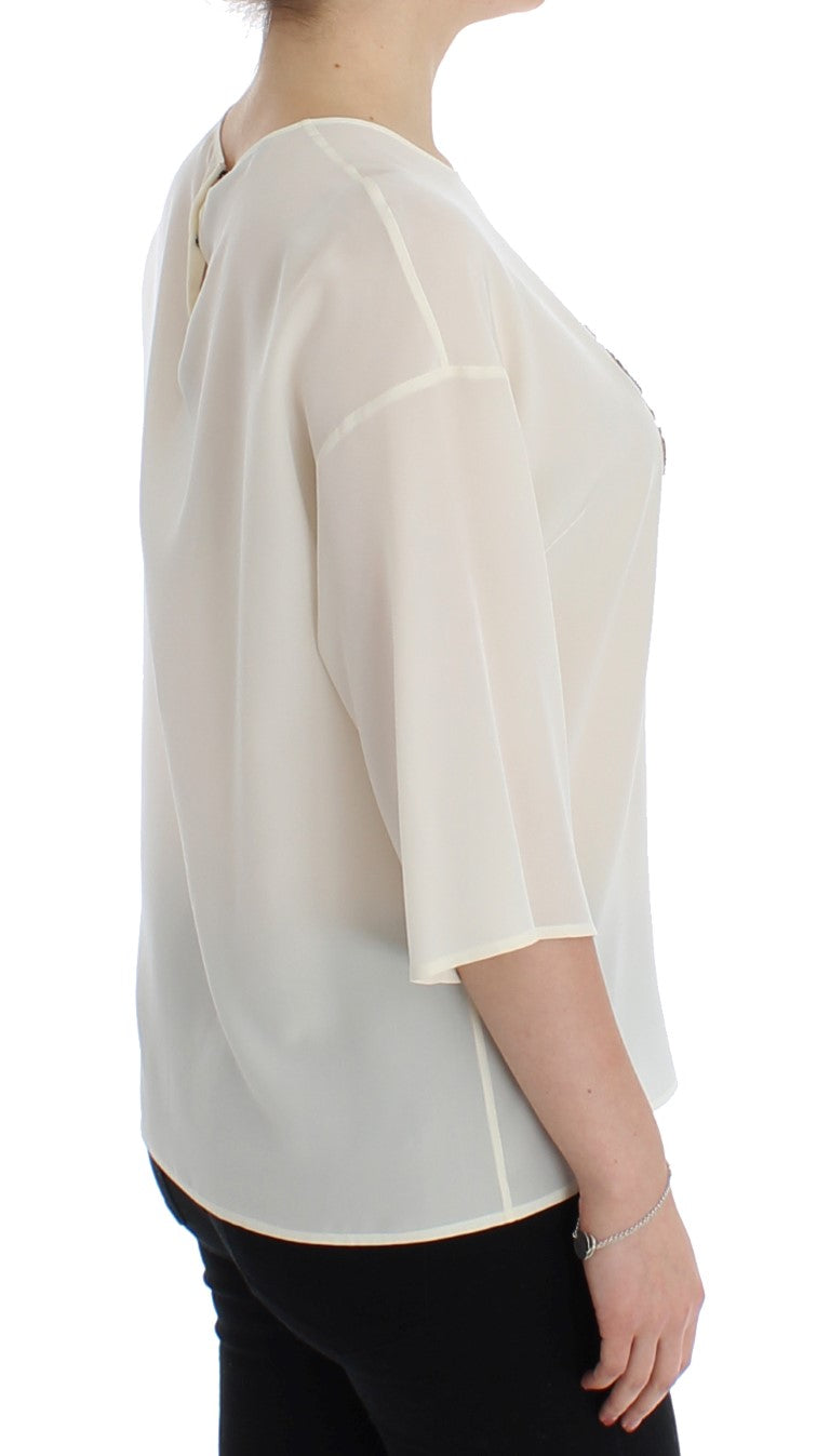 Chemise en soie blanche Dolce & Gabbana avec sequins, style blouse ou t-shirt, élégante et brillante.