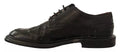 Chaussures Derby en cuir perforé noir de Dolce & Gabbana avec laçage, élégantes et sophistiquées pour homme.