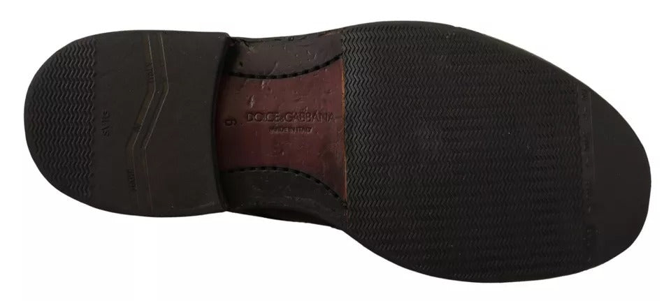 Chaussures Derby en cuir perforé noir de Dolce & Gabbana avec lacets, style élégant et sophistiqué.