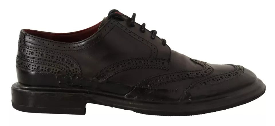 Chaussures Derby en cuir perforé noir Dolce & Gabbana à lacets, style élégant et sophistiqué pour homme.