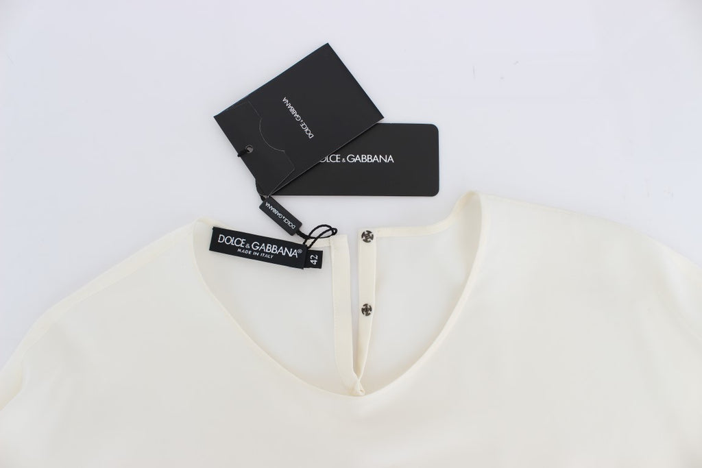 Blouse en soie blanche de Dolce & Gabbana avec sequins, style T-shirt, haut élégant et brillant.
