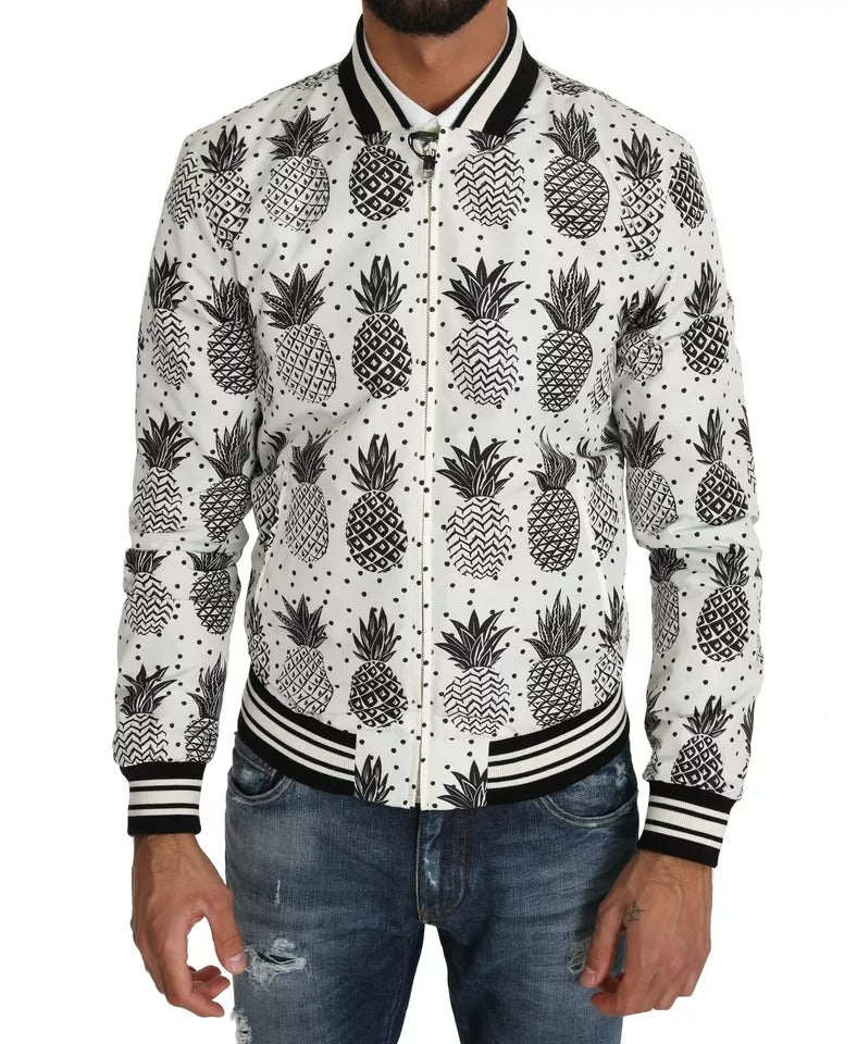 Veste bomber Dolce & Gabbana blanche et noire avec motif ananas, style tendance et design moderne.