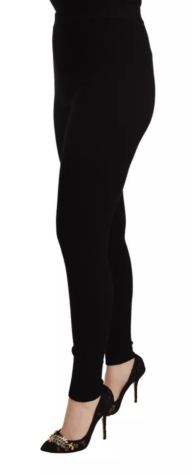 Pantalons noirs à taille haute en tissu stretch de Dolce & Gabbana, coupe élégante et moderne.