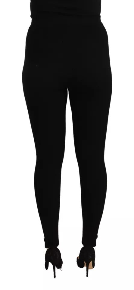 Pantalon noir Dolce & Gabbana taille haute en tissu extensible, style élégant et ajusté, pour femmes.