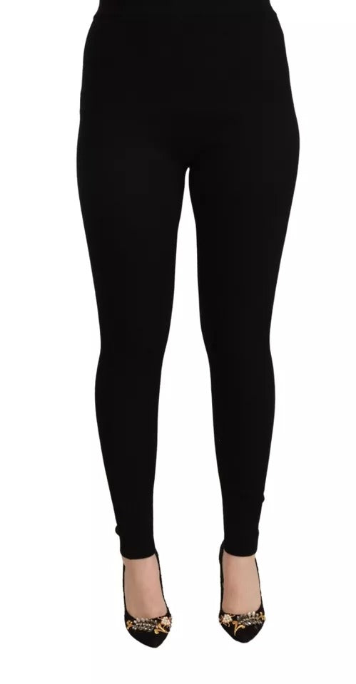 Pantalons noirs Dolce & Gabbana taille haute en tissu extensible, style élégant et ajusté pour femmes.