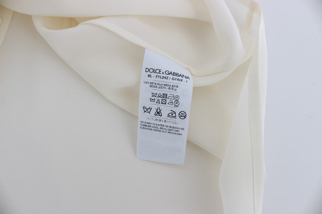 Chemise en soie blanche Dolce & Gabbana avec sequins, style t-shirt, haut élégant et brillant.